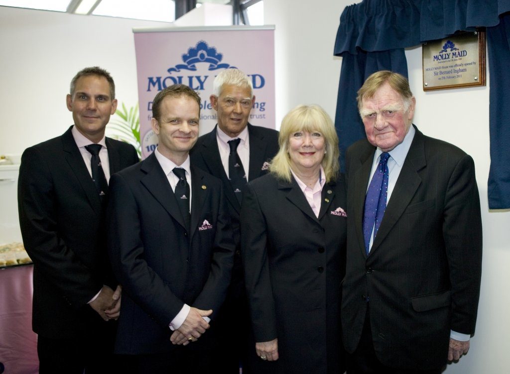 MOLLY MAID Owner and directors with Sir Bernard Ingham